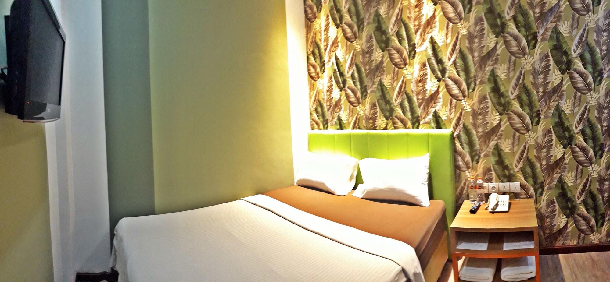 Kama Hotel Медан Экстерьер фото